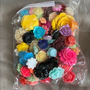 Bag of random flower accessories plastic crafts
